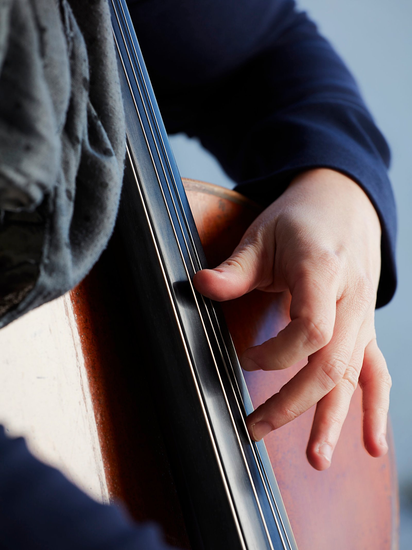 cellist-player-hands-violoncellist-playing-cello-background-field-musical-art-concept-passion-music-classical-music-professional-cello-player-solo-perform